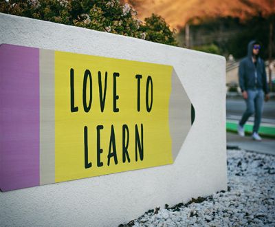 Love to learn Intermediate English Grammar sign with simple explanations and examples